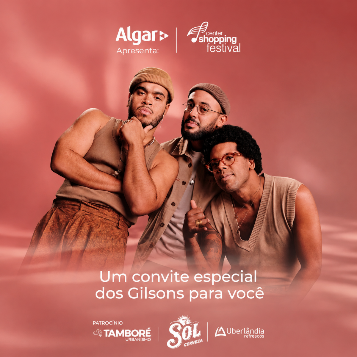 Banner promocional do show da banda Gilsons no Center Shopping Festival 2026 em Uberlândia. A imagem mostra os três integrantes da banda sobre um fundo rose e logos dos patrocinadores Algar, Tamboré e Sol Cerveza. Data: 14 de maio no Center Convention.